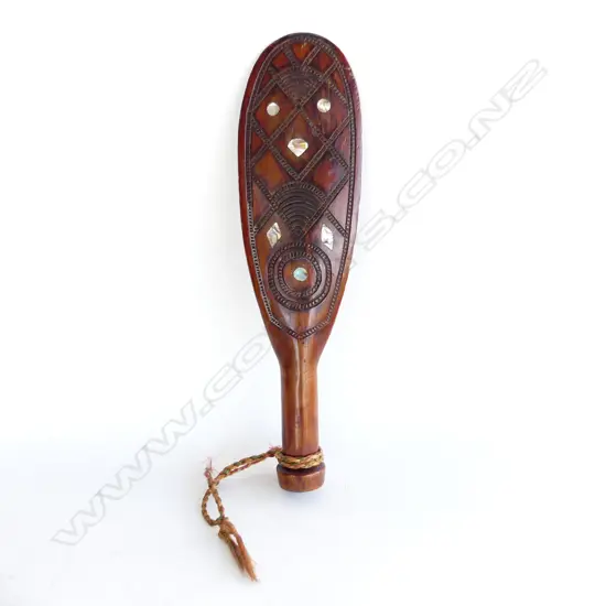An early 20thC Māori carved wooden patu,